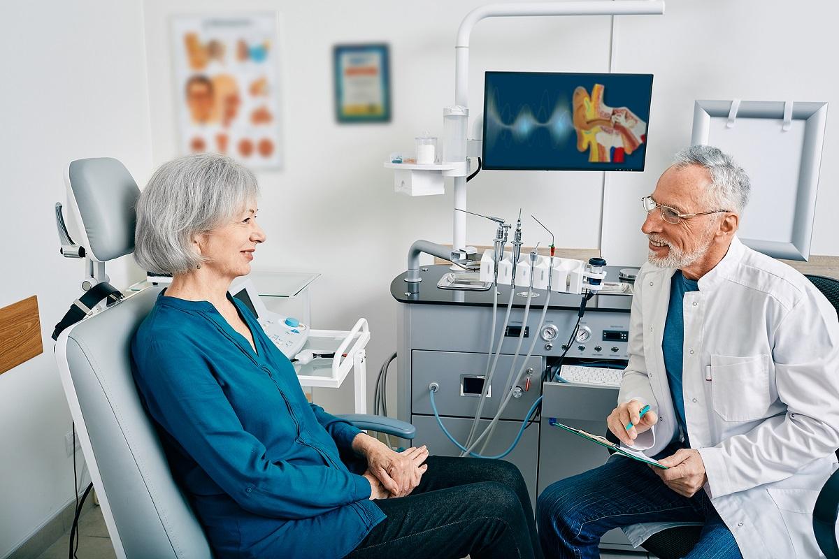 Senior woman being examined by audiologist