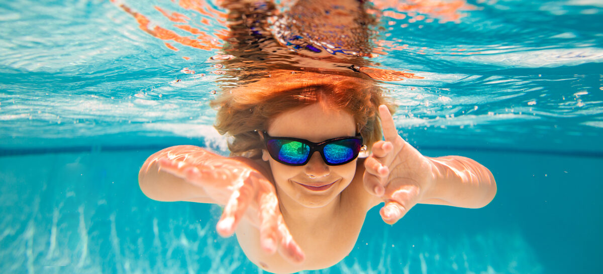 Child swimming under water